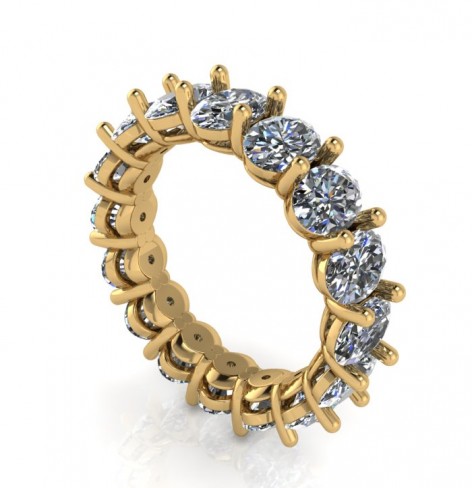 18K Yellow Gold And Oval Shaped Diamonds.